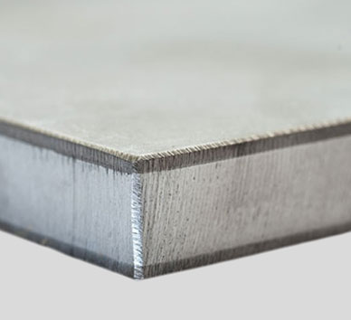 Bimetallic metallurgical clad plate